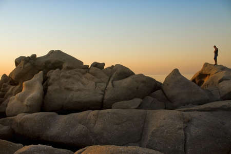 silhouette of a man at sunsetの写真素材