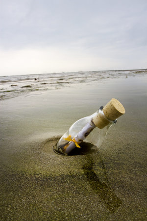 Message in the bottle on the beachの写真素材