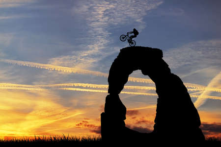 Bike trial at sunsetの写真素材