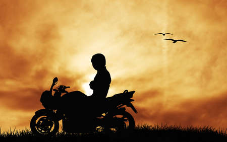 motorcyclist at sunsetの写真素材