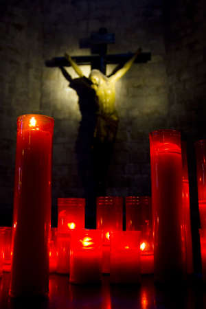 crucifix with candlesの写真素材