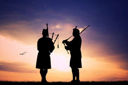 Pipers at sunsetの写真素材