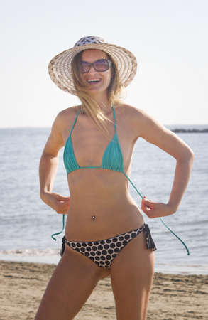 Blonde girl on the beachの写真素材