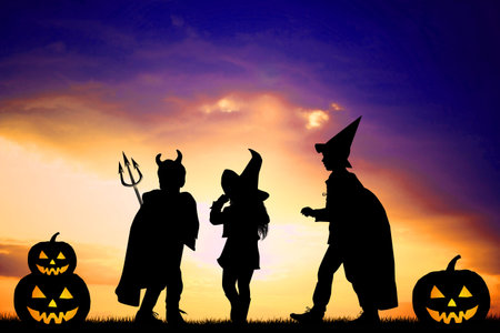 children in costume at Halloween