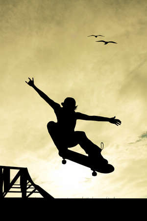 skateboarder at sunsetの写真素材