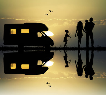 Family camping with caravanの写真素材