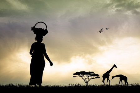 African woman at sunsetの写真素材