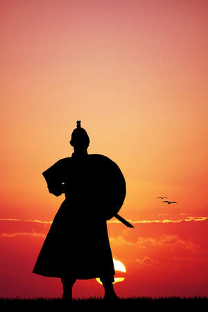 Samurai with sword at sunsetの写真素材