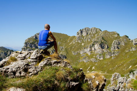 man on mountain peakの写真素材