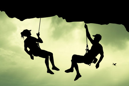 man and girl climbersの写真素材