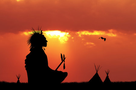 Red skin silhouette at sunsetの写真素材