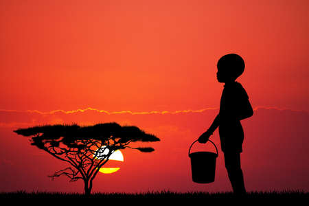 African child with waterの写真素材