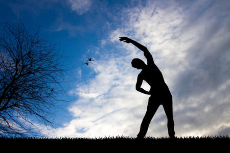 man doing sport at sunsetの写真素材