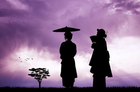 Women geishas at sunsetの写真素材