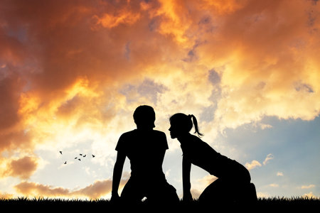 couple kissing at sunsetの写真素材
