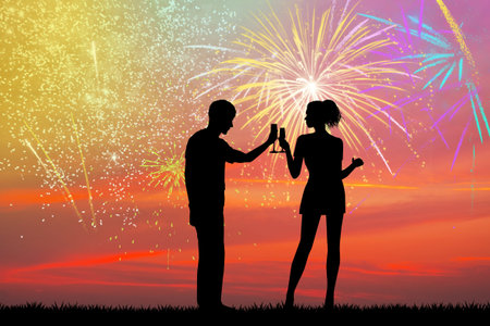 New Year's toast with fireworks explosionの写真素材