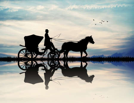 carriage with horse at sunsetの写真素材