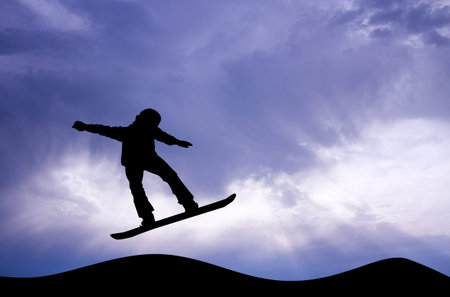 snowboarder silhouette at sunset