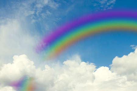 rainbow in the blue skyの写真素材