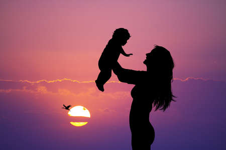 mother and baby silhouetteの写真素材