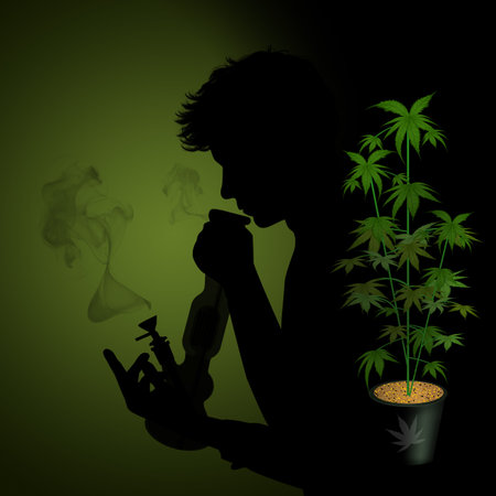 man smoke a glass bong