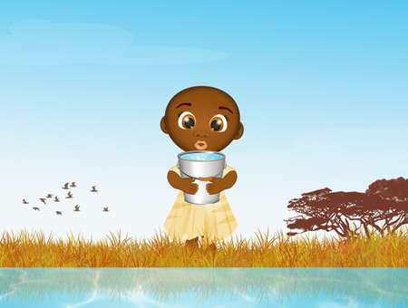 African child takes water to the riverの写真素材