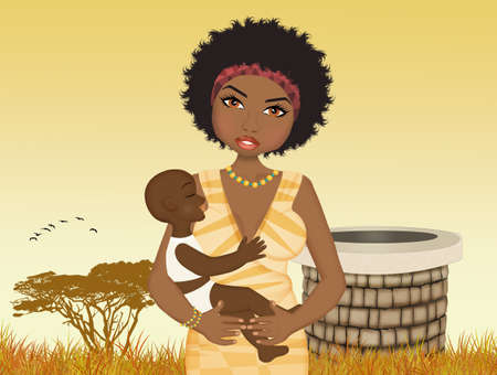 African woman with child in the wellの写真素材