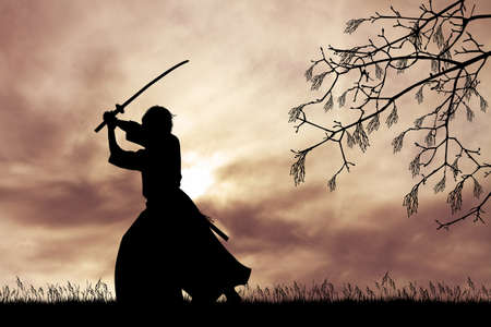 Samurai with sword at sunsetの写真素材