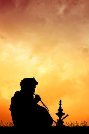 Muslim man smoke hookahの写真素材
