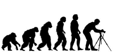 human evolution with photographer man with tripodの写真素材