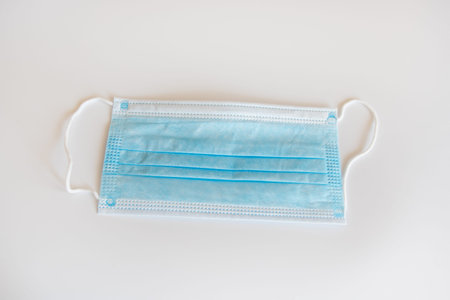 Surgical masks on white