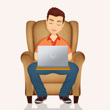 man with laptop sitting on the armchairの写真素材