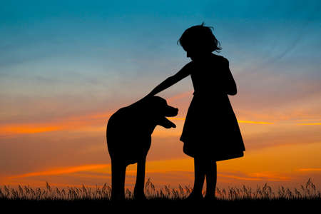 the dog and the girlの写真素材