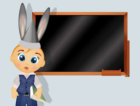 school boy with donkey hatの写真素材