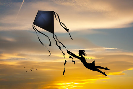 girl hanging on the kiteの写真素材