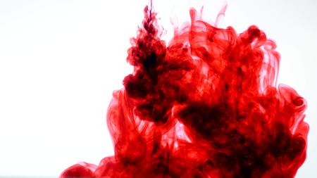 Red ink in water Abstract.の写真素材