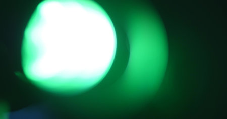 abstract green light background on black.の写真素材