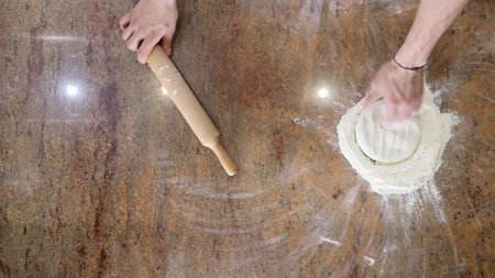 Chef preparing a pizza. Pizza Place. Food Preparation. Pizza Chef.Chef tossing pizza dough in...