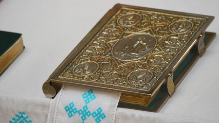 cross on the table of the priest.