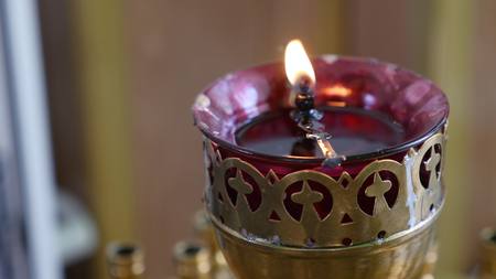 Red candle in the church.の写真素材