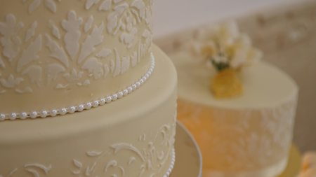 a close up of a beautifully decorated wedding cake.の写真素材