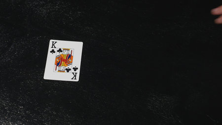Four kings on a wooden background is a strong combination in poker, table games are popular all over...