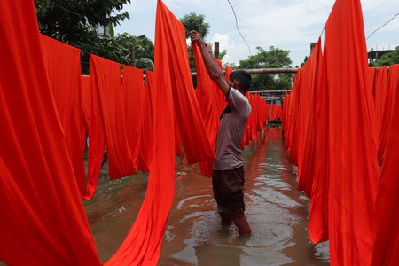 textile fabric drying in the sunの写真素材