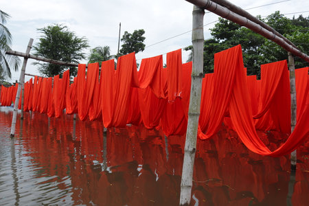 textile fabric drying in the sunの写真素材