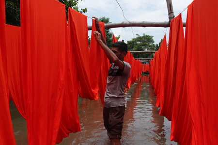 textile fabric drying in the sunの写真素材