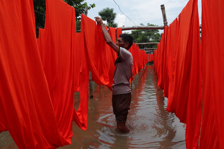 textile fabric drying in the sunの写真素材