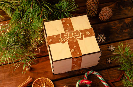 box with an engraving of a bow and ribbon on the lidの写真素材