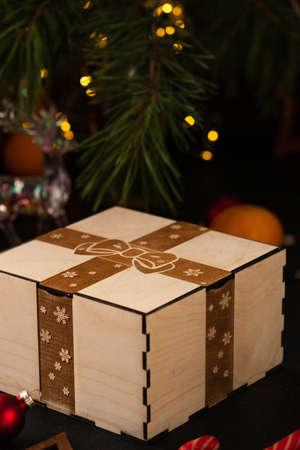 box with an engraving of a bow and ribbon on the lidの写真素材