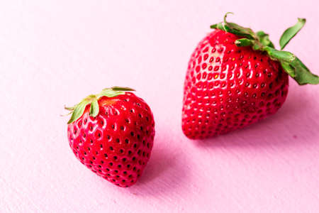 macro photography of strawberries. berries of ripe red strawberries are largeの写真素材