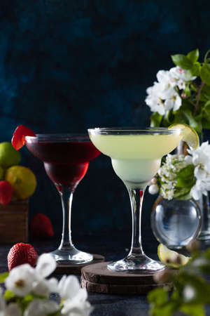 margarita glass is full of drink. margarita cocktail is on the table.の写真素材